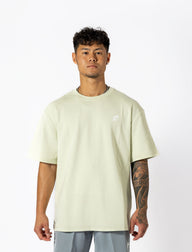  Oversized mint-green tee with white lettering "Conquer Your Demons," perfect for training, layering, or relaxed casual outings.